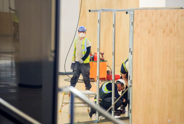 Workers in the conference centre