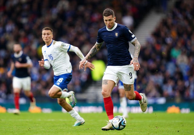 Lyndon Dykes is in line to start for Scotland