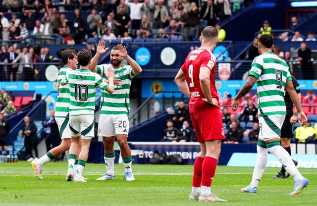 Cameron Carter-Vickers (third left) celebrates Celtic's opener with team-mates