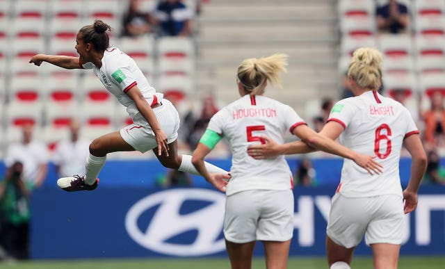 England's Nikita Parris celebrates scoring her penalty