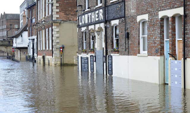 Communities need to be resilient to flooding which will increase with climate change (John Giles/PA)