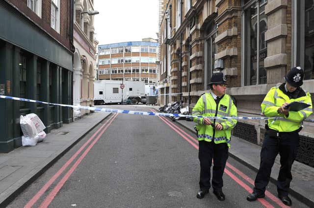 Police remain at Borough Market following the London Bridge terror attack (Nick Ansell/PA)