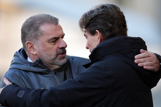 Ange Postecoglou, left, embraces Thomas Frank before February's Premier League clash between Tottenham and Brentford