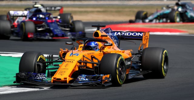 Fernando Alonso racing for McLaren at the 2018 British Grand Prix