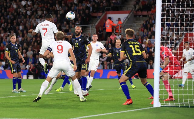 Raheem Sterling, second left, scores in England's 5-3 win over Kosovo