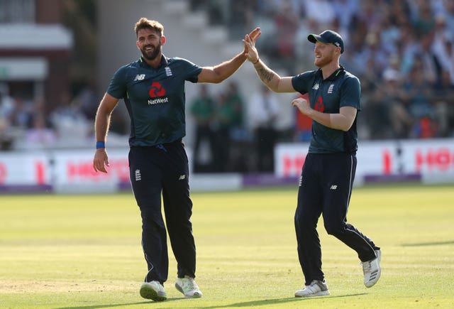 Liam Plunkett, left, celebrates a wicket with Ben Stokes