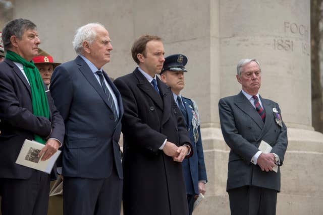 Lt-Col Eric Becourt-Foch (second left), great-grandson of Marshal Ferdinand Foch, Lord Astor of Hever (right), grandson of Field Marshal Douglas Haig, and Culture Secretary Matt Hancock (centre) were among those attending the ceremony (Victoria Jones/PA)