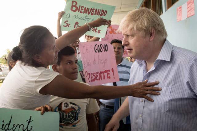 Foreign Secretary Boris Johnson meets pupils, parents and staff at a village school (Stefan Rousseau/PA)
