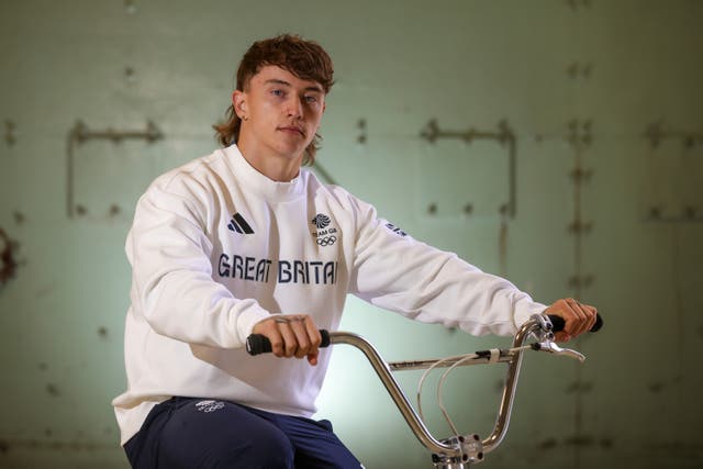 Kieran Reilly poses for a picture on his bike.
