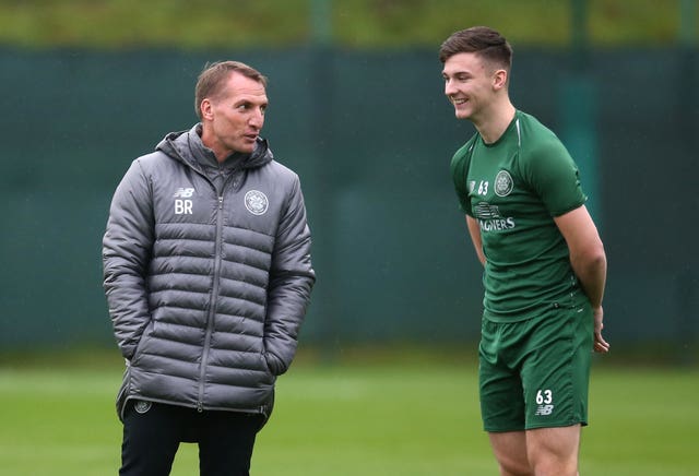 Rodgers wants Kieran Tierney (right) and the rest of his defence to tighten up