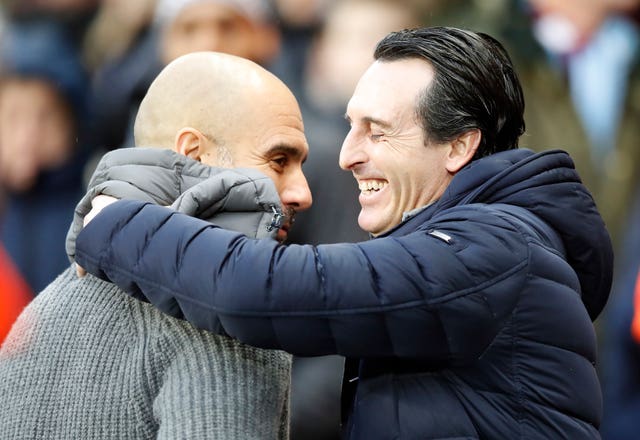 Pep Guardiola, left, got the better of Unai Emery as Manchester City overcame Arsenal on Sunday
