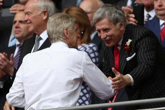 Stan Kroenke (right) is set to take complete control of Arsenal in the coming months.
