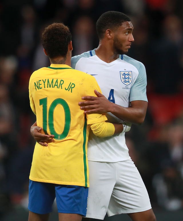 Joe Gomez (right) helped keep Brazil’s Neymar (left) quiet during the goalless draw between the two nations