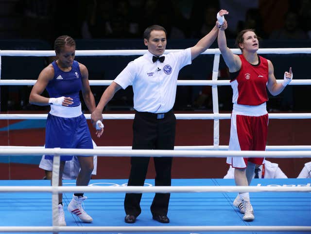 Katie Taylor, right, beat Natasha Jonas, left, in their lightweight quarter-final at the London Olympics nine years ago (Nick Potts/PA)