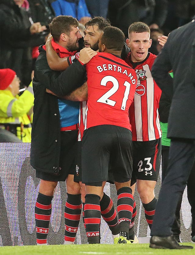 Southampton players celebrate Charlie Austin's goal before it was disallowed
