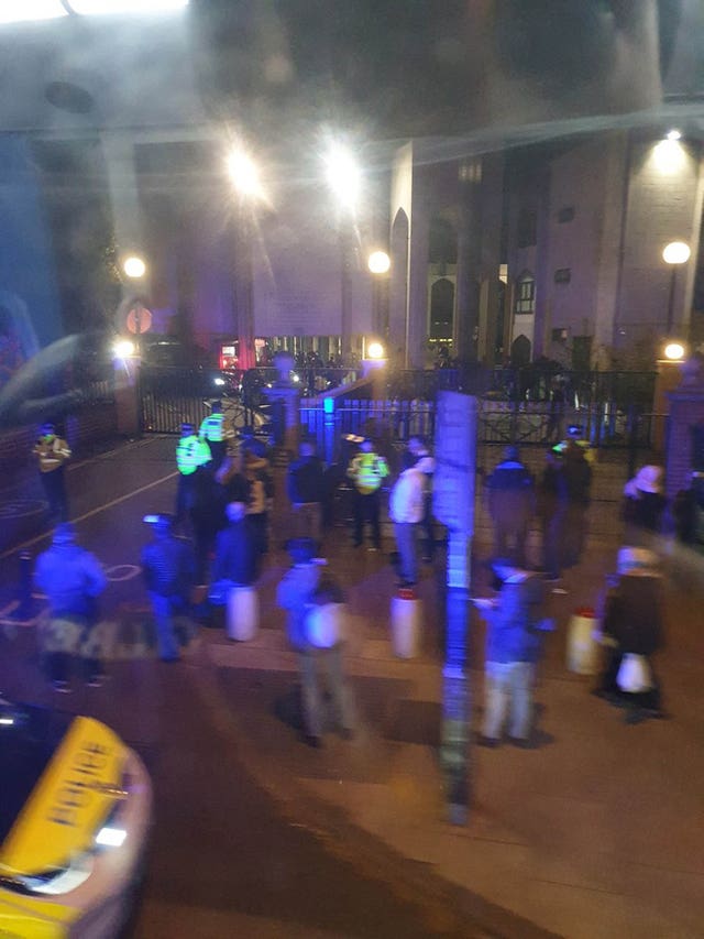 Police and members of the public outside London Central Mosque