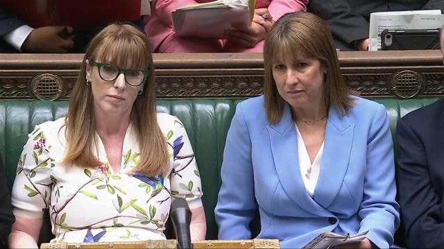 Angela Rayner, left, sitting on the front bench at PMQs next to Rachel Reeves