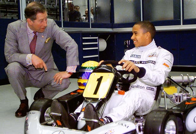 A young Lewis Hamilton with Prince Charles