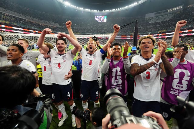 England’s Harry Kane (centre), Declan Rice (centre left), Ollie Watkins (centre right) lead the celebrations after the side's World Cup victory over Mexico