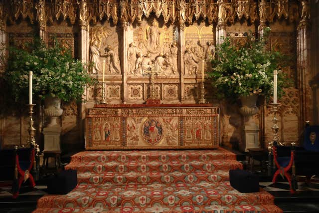Flowers and foliage at the High Altar of St George’s Chapel (Danny Lawson/PA)