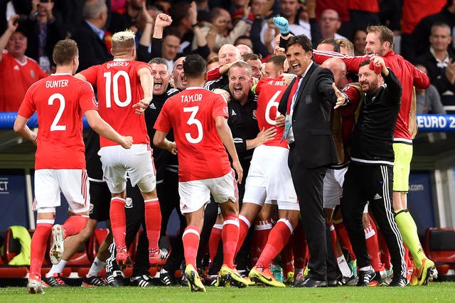 Chris Coleman, front right, and Wales celebrate during the Euro 2016 quarter-final win over Belgium