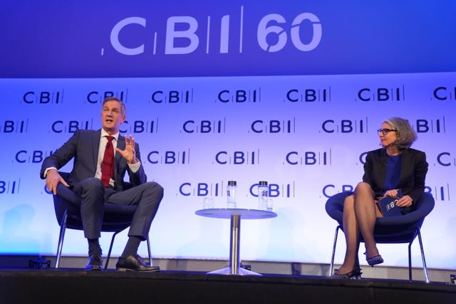 Business Secretary Peter Kyle and CBI chief executive Rain Newton-Smith on stage during the Confederation of British Industry annual conference at Queen Elizabeth II Centre, central London