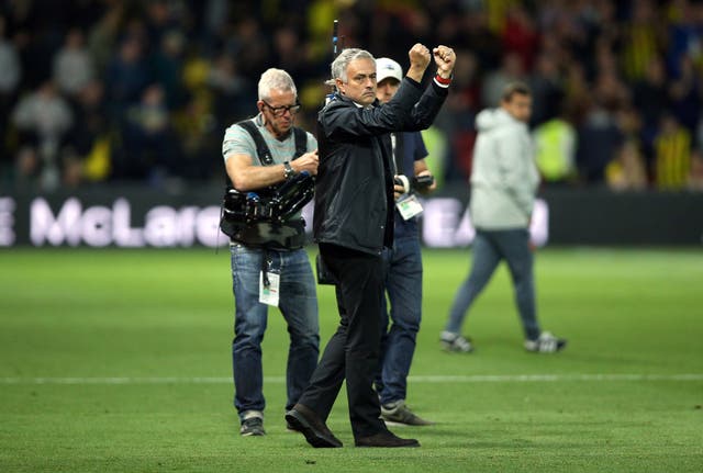 Jose Mourinho celebrates after the final whistle as Manchester United held on for victory 