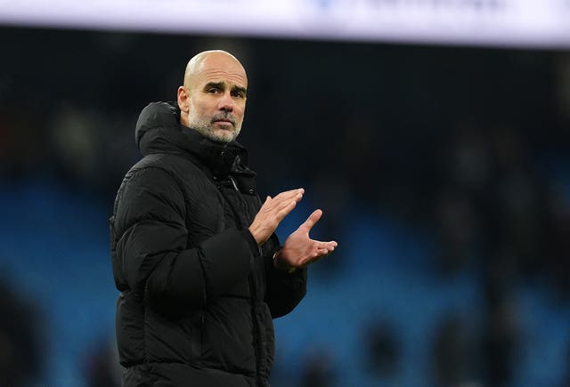 Pep Guardiola applauds the Manchester City fans