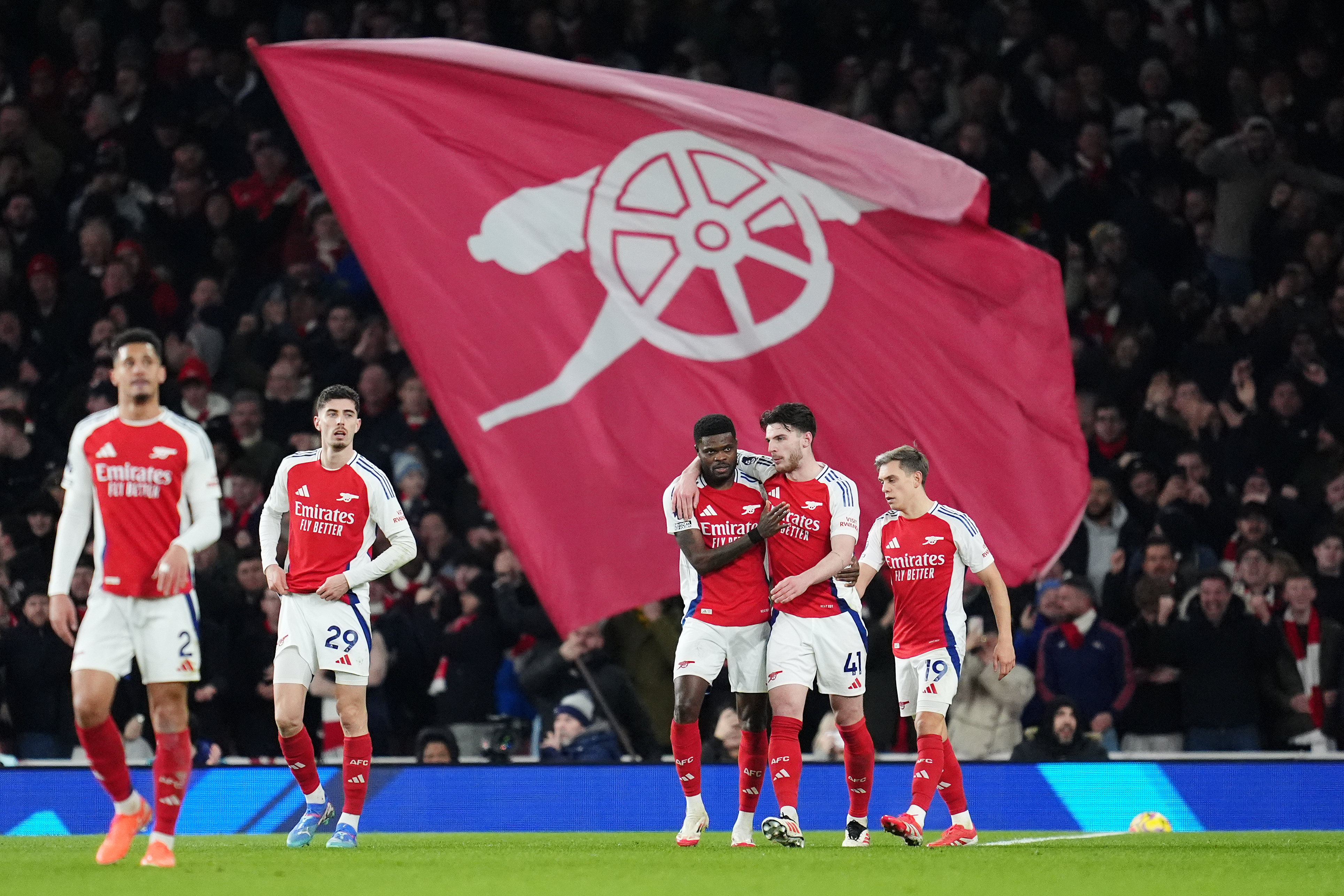 Thomas Partey (centre left) celebrates scoring their side’s second goal