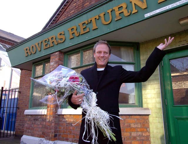 Coronation Street's Sean Tully (Antony Cotton) outside the Rovers Return pub