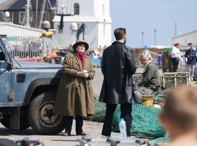 Brenda Blethyn as DCI Vera Stanhope, and David Leon, who plays DS Joe Ashworth, on set during the filming of the ITV crime drama Vera on the Fish Quay in North Tyneside in 2023