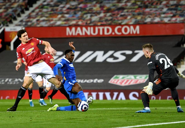 Manchester United’s Harry Maguire challenges Brighton''s Danny Welbeck
