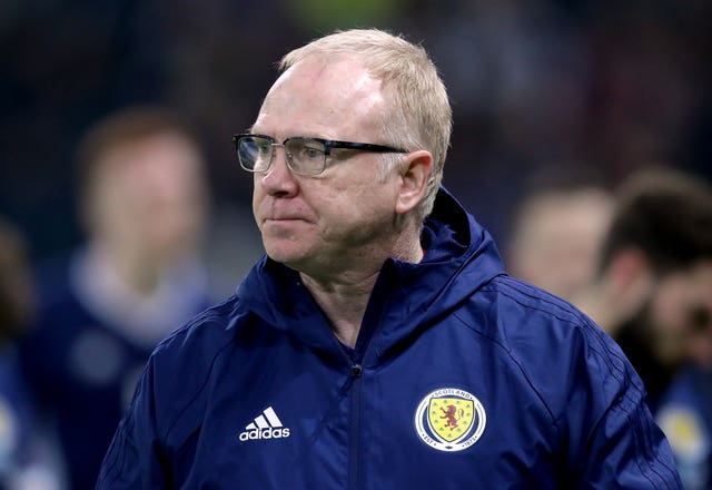 Alex McLeish watches on as his side fall to a heavy defeat 