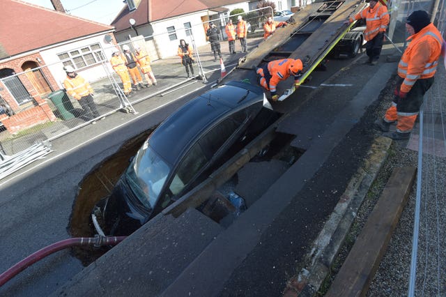 Removal of the Toyota vehicle began before midday on Monday (Nick Ansell/PA)