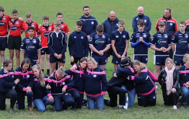 Players observe a minute’s silence at East Grinstead rugby club