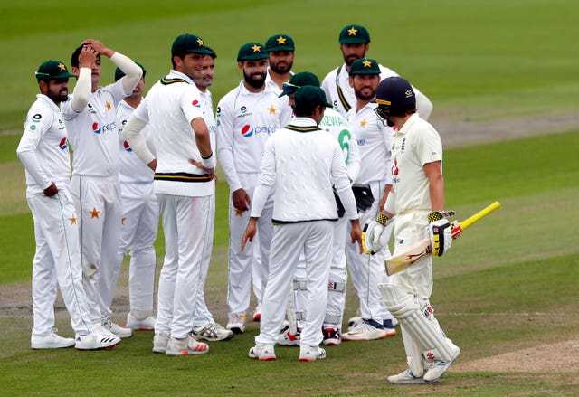 Rory Burns makes his way off the pitch after being dismissed by Pakistan’s Mohammad Abbas
