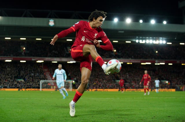 Liverpool close gap on Manchester City after edging past West Ham