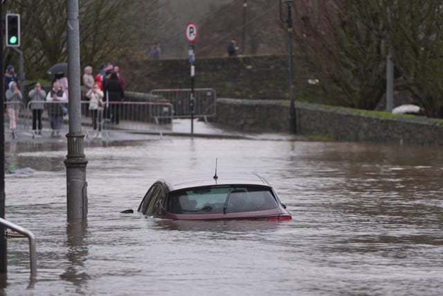 A car is engulfed in floodwater in Enniscorthy, Co Wexford