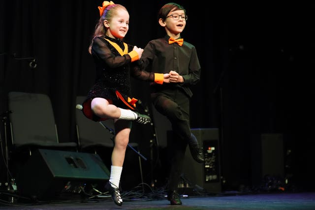 Irish dancers perform during a visit by Irish President Catherine Connolly to the Irish Cultural Centre in Hammersmith, west London