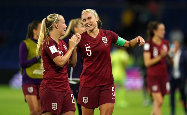 Beth Mead celebrates England's win with captain Steph Houghton