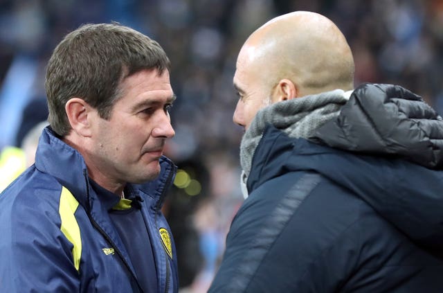 Burton manager Nigel Clough, left, and Pep Guardiola will face each other again on Wednesday