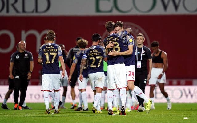 Barnsley celebrate survival after their win at Brentford