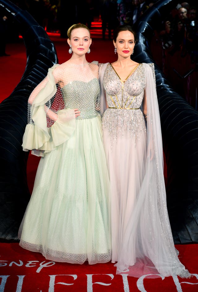 Elle Fanning (left) and Angelina Jolie