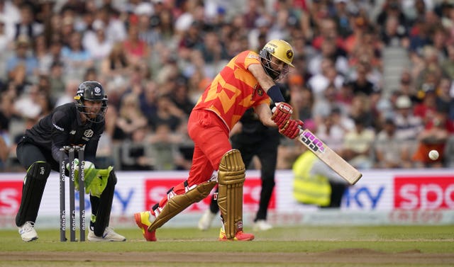 Moeen Ali, right, hits out against Manchester Originals in The Hundred