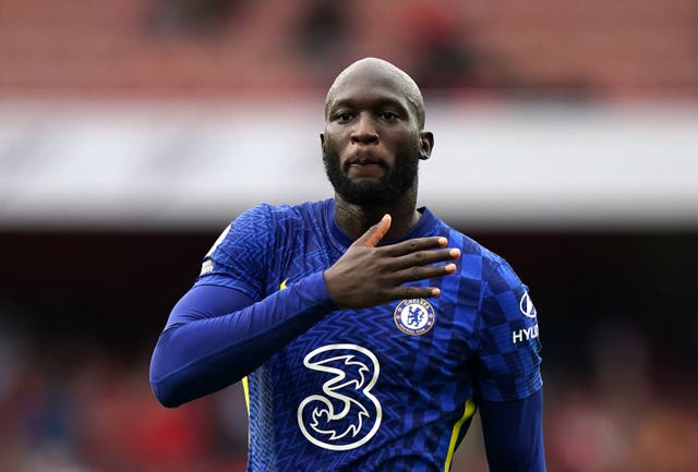 Romelu Lukaku pats the club crest on his shirt