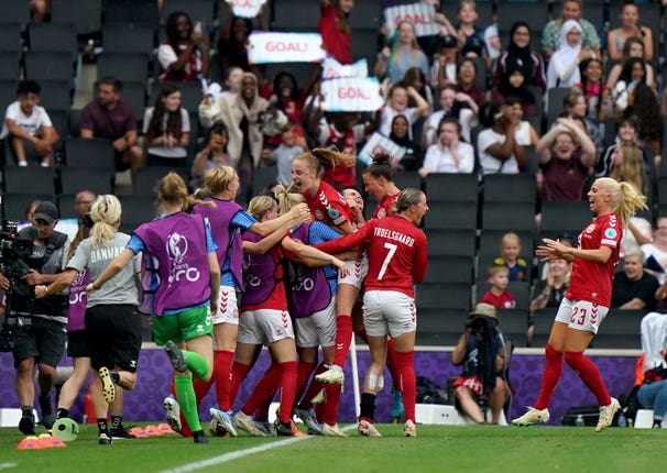Denmark celebrate Pernille Harder's winner against Finland