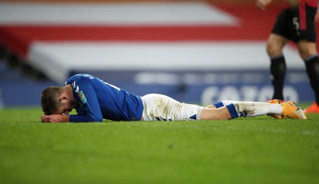 Gylfi Sigurdsson appears dejected on the floor