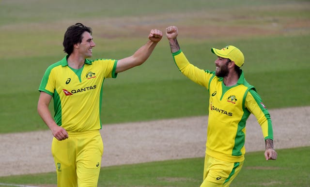 Australia's Pat Cummins celebrates with Glenn Maxwell (right) after taking the wicket of England's Jonny Bairstow