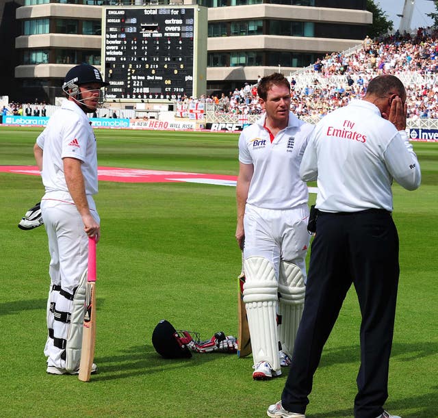 Ian Bell, left, and batting partner Eoin Morgan wait for the umpire's decision on the controversial run out