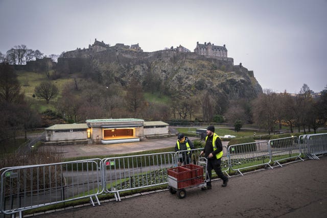 Staff taking down the Edinburgh Hogmanay stage in Princes Street Gardens